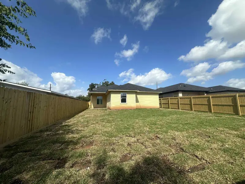 Exterior details and patio area of a home in , Clute (Image 3). Exterior details and patio area of a home in , Clute (Image 3).
