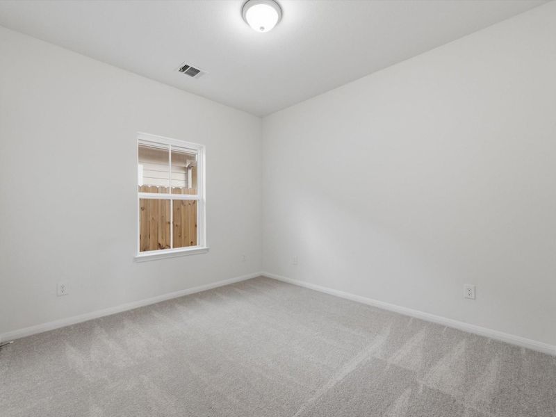 Spacious secondary bedrooms provide comfort, privacy, and versatile living options.