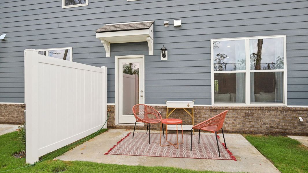 Representative exterior photo of a completed home built from the MEDFORD by D.R. Horton in River Landing Townhomes, Murfreesboro, TN (Image 23).