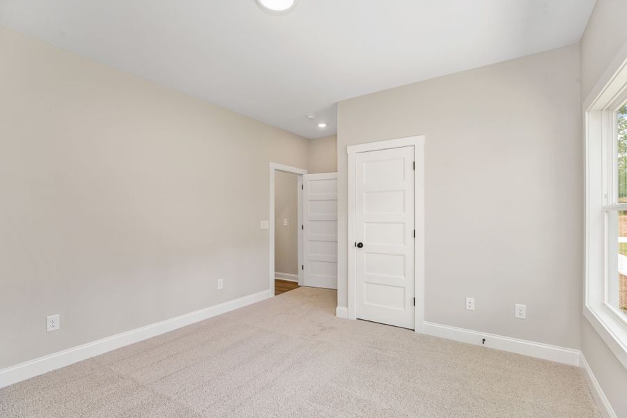 Spacious, unfurnished interior of a new home in Flint Farms, Concord (Image 14).