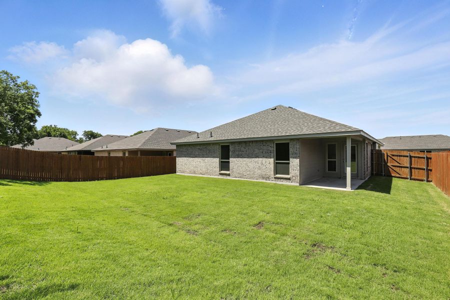 Representative exterior photo of a completed home built from the Hanover by Cheldan Homes in Craftsmen's Corner, Cleburne, TX (Image 27).
