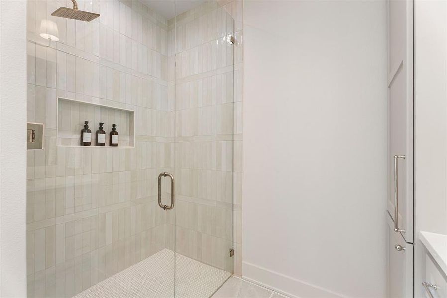 Bathroom featuring a shower stall