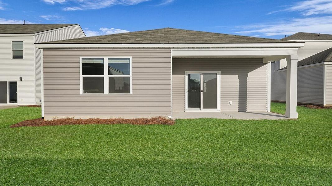 Exterior details and patio area of a home in Pine Hills at Cane Bay, Summerville (Image 22). Exterior details and patio area of a home in Pine Hills at Cane Bay, Summerville (Image 22).