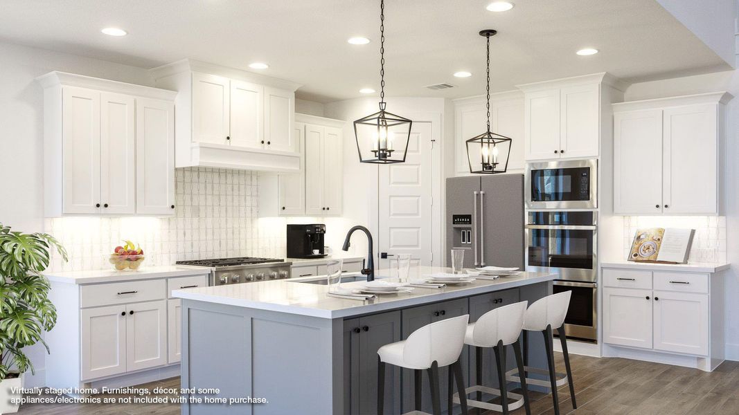 Kitchen with decorative backsplash, a kitchen bar, dark wood-type flooring, stainless steel appliances, and white cabinets Kitchen with decorative backsplash, a kitchen bar, dark wood-type flooring, stainless steel appliances, and white cabinets