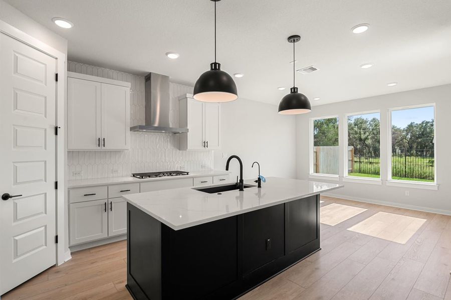 Furnished interior view inside a new home in Terrace Collection at Lariat, Liberty Hill (Image 9). Furnished interior view inside a new home in Terrace Collection at Lariat, Liberty Hill (Image 9).