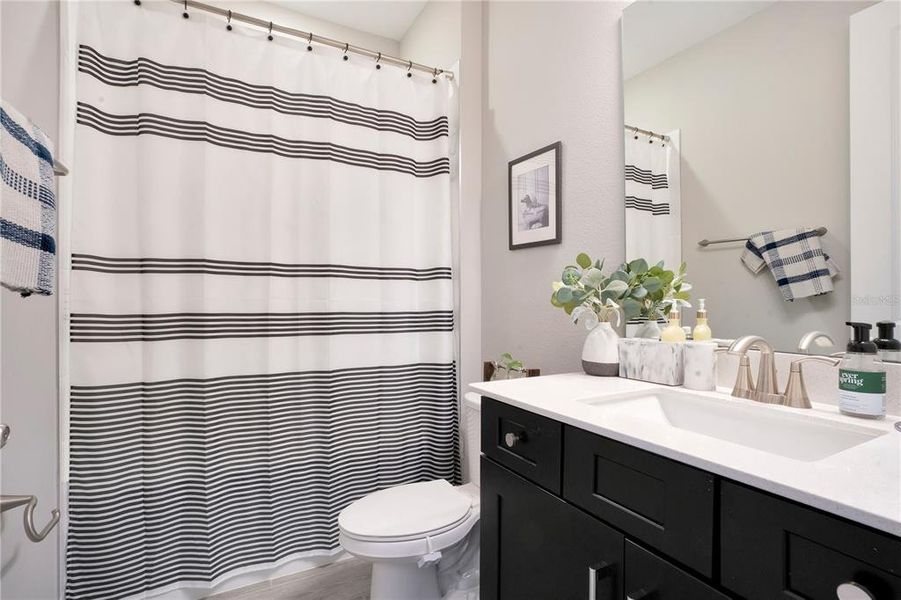 Furnished interior view inside a new home in Legends Preserve - Reserve Series, Daytona Beach (Image 8).