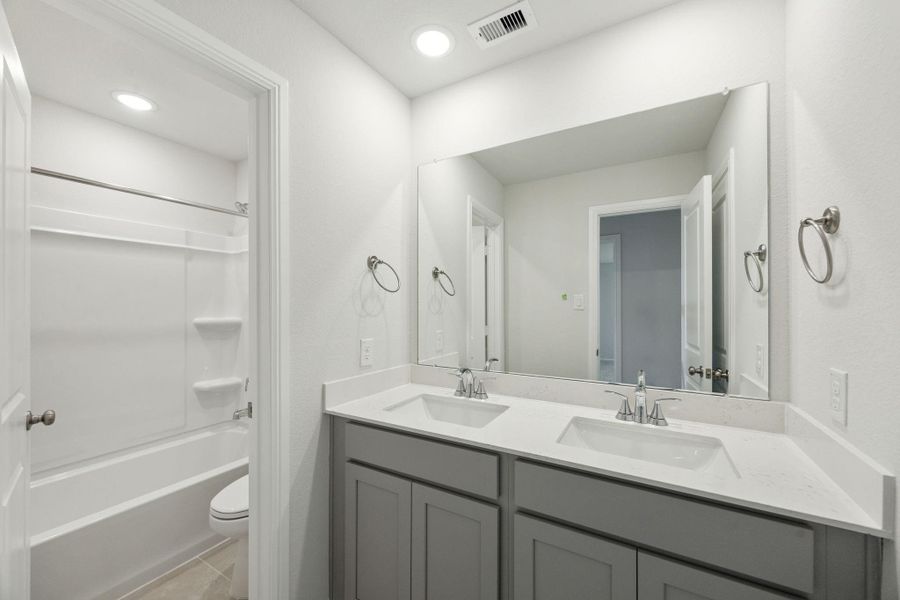 Furnished interior view inside a new home in Saint Tropez, Huffman (Image 6).