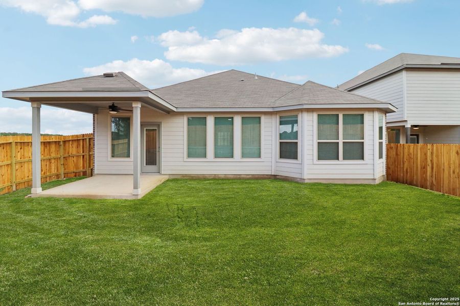 Exterior details and patio area of a home in Remington Ranch, San Antonio (Image 23).