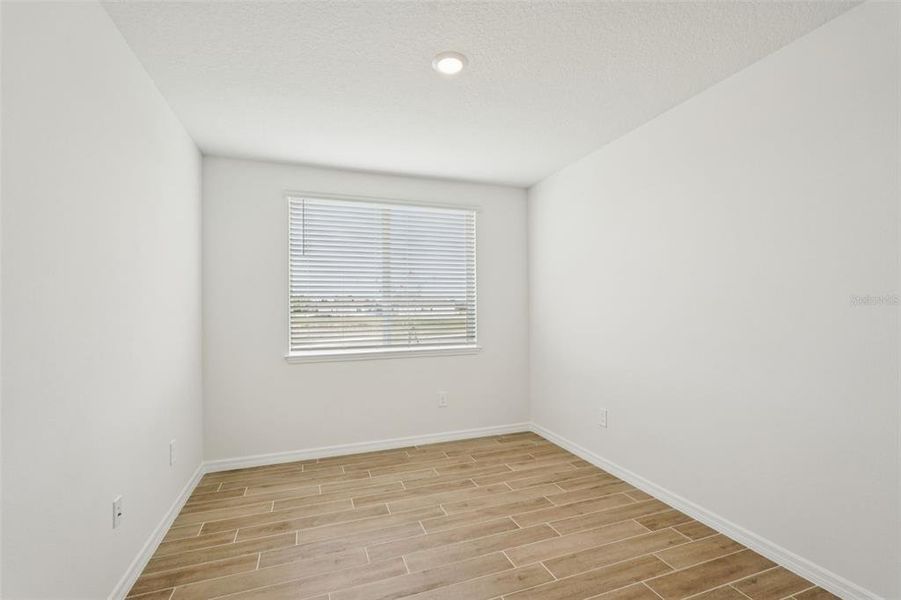 Spacious, unfurnished interior of a new home in Oakfield Trails - Signature Series, Parrish (Image 25).