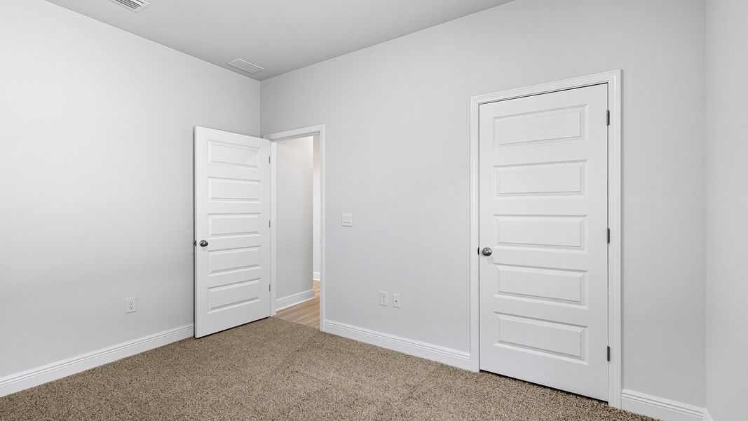 Spacious, unfurnished interior of a new home in Ashton Park Phase III, Freeport (Image 26). Spacious, unfurnished interior of a new home in Ashton Park Phase III, Freeport (Image 26).