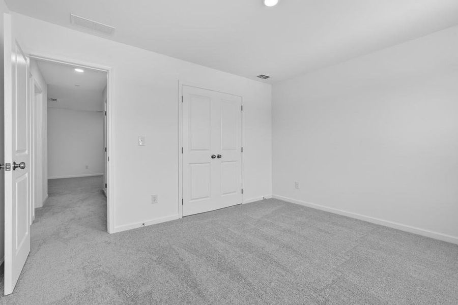 Spacious, unfurnished interior of a new home in Weatherfield, Buford (Image 31).