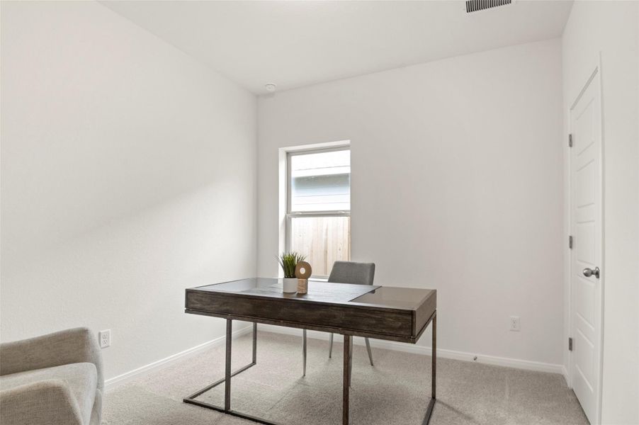 Office featuring carpet floors and baseboards