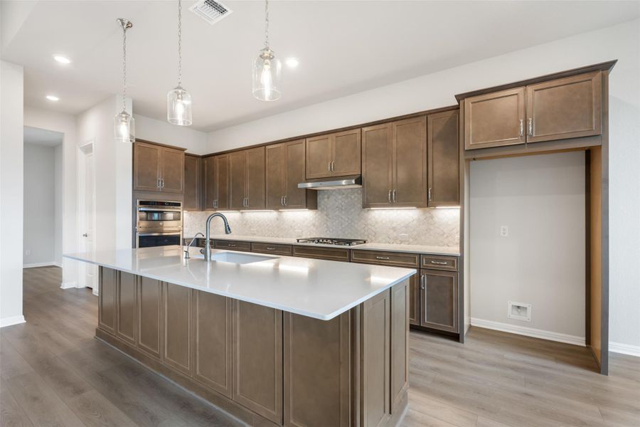 Furnished interior view inside a new home in The Trails at Carmel, Pflugerville (Image 14).