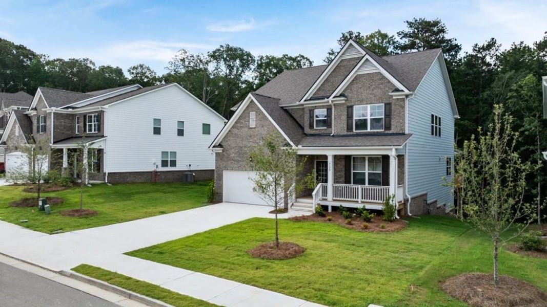 Front exterior of a new home in Butner Estates, South Fulton, GA, highlighting curb appeal (Image 11).