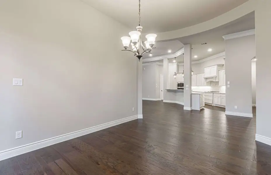 Representative unfurnished interior of a home built from the 3616 by Ravenna Homes in Artavia 70′, Conroe (Image 30).