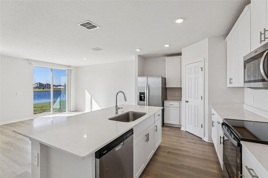 Furnished interior view inside a new home in Lake Deer Estates - Signature Series, Poinciana (Image 6).