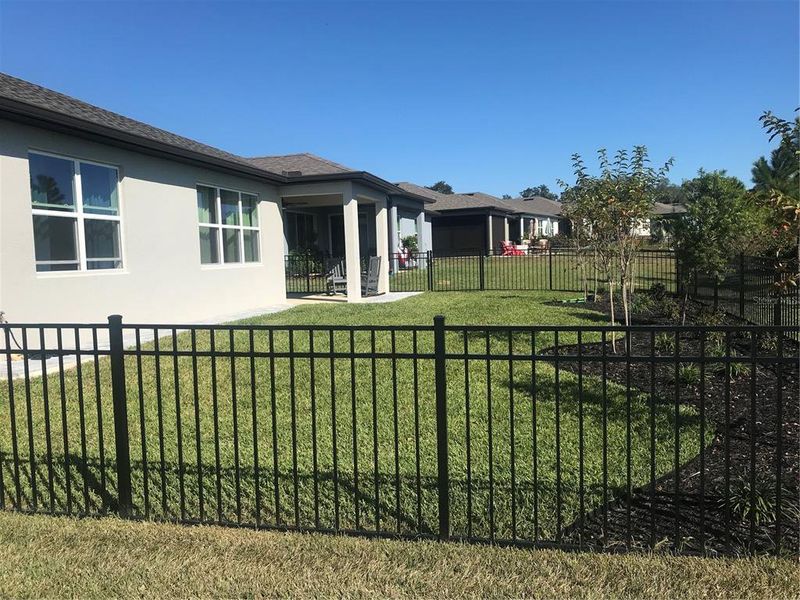 Exterior details and patio area of a home in Del Webb Stone Creek, Ocala (Image 2).