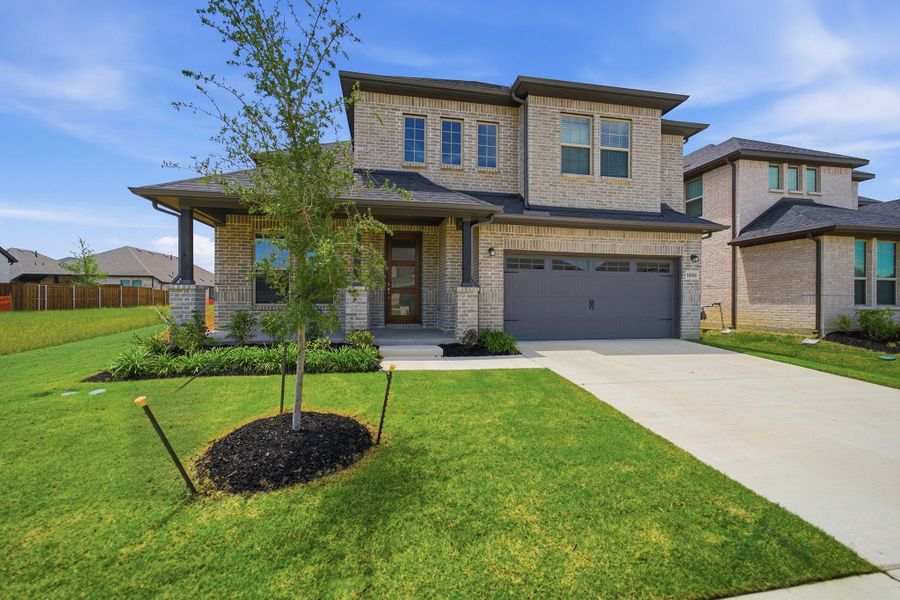 Front exterior of a new home in La Terra, Celina, TX, highlighting curb appeal (Image 2).