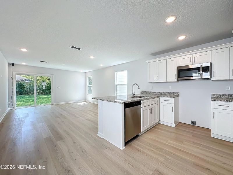 Furnished interior view inside a new home in , Jacksonville (Image 6).