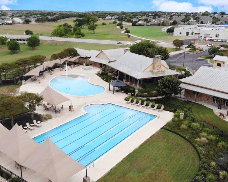 Community pool featuring a patio area