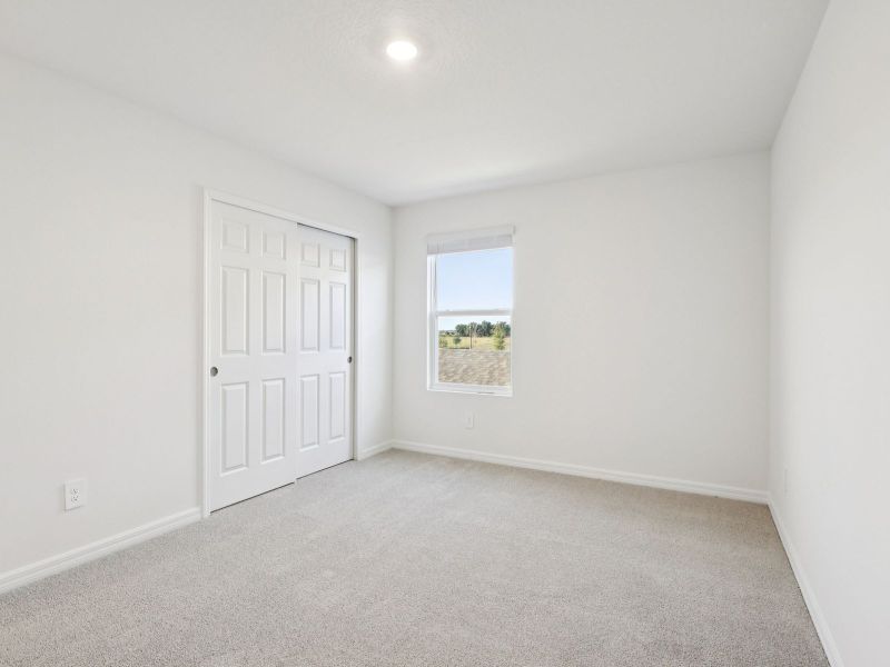 Spacious, unfurnished interior of a new home in Hamilton Bluff - Signature Series, Haines City (Image 11).
