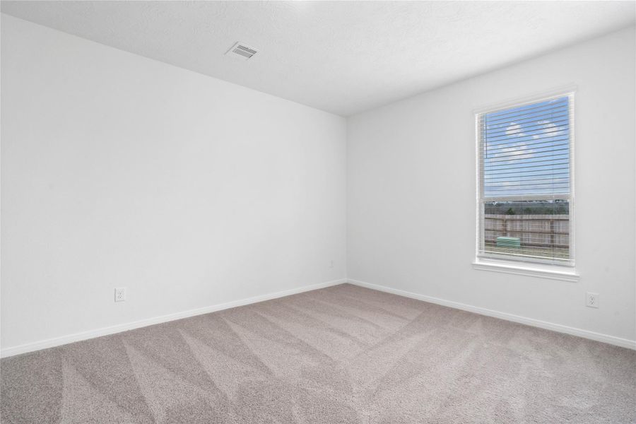 Right off the Great Room is the Den! The Den offers a versatile space that seamlessly expands your living options—perfect for a home office, playroom, media space, or whatever suits your lifestyle.