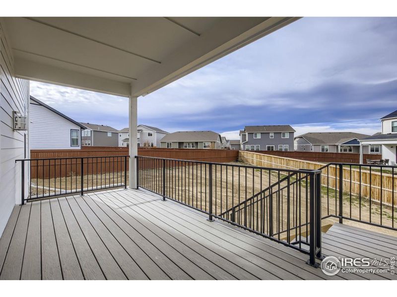 Exterior details and patio area of a home in RainDance National 60/70, Windsor (Image 3).