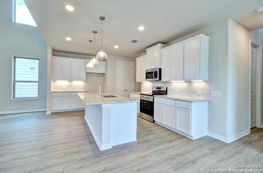 Furnished interior view inside a new home in Casinas at Gruene, New Braunfels (Image 3).