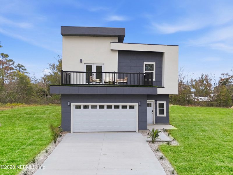 Front exterior of a new home in , Orange Park, FL, highlighting curb appeal (Image 21).