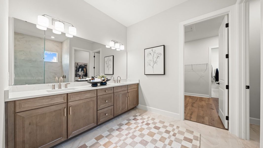 Furnished interior view inside a new home in Esplanade at Kingston, Estero (Image 7).