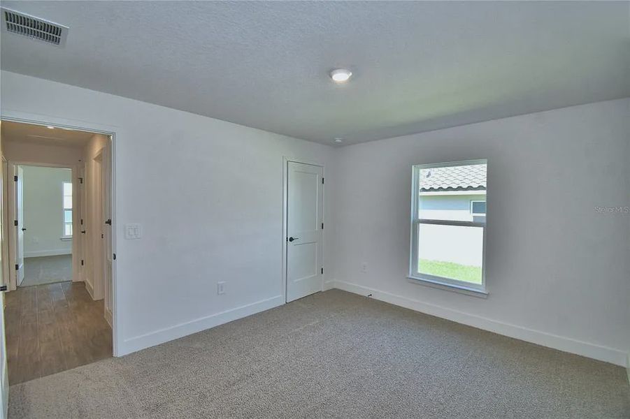 Spacious, unfurnished interior of a new home in Lake Juliana Estates, Auburndale (Image 27).