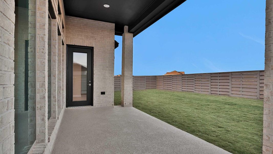Exterior details and patio area of a home in Austin Point 60', Richmond (Image 3).