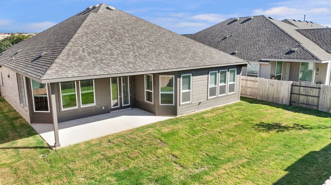 Exterior details and patio area of a home in Highland Village, Georgetown (Image 25).