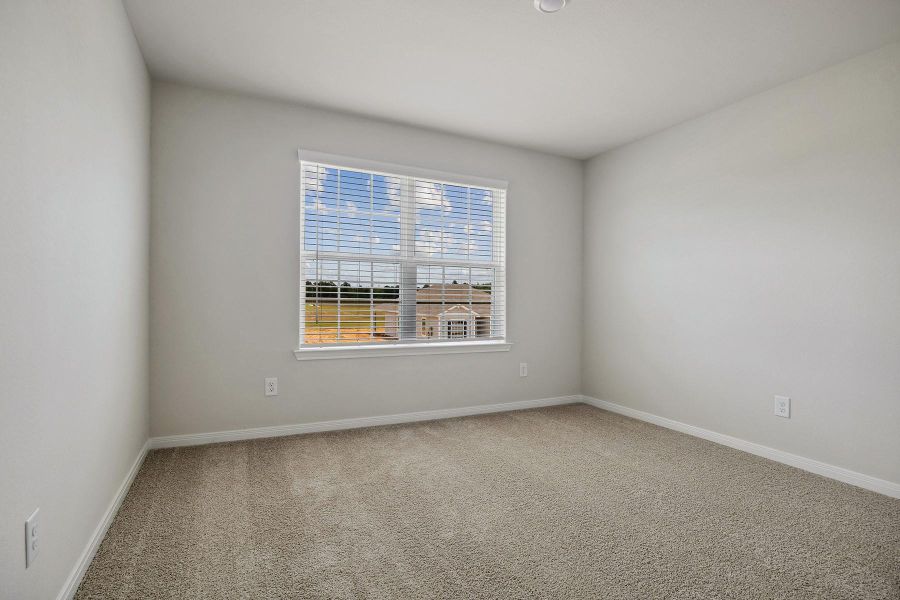 Spacious, unfurnished interior of a new home in Trails at Cochran Ranch, Waller (Image 11).