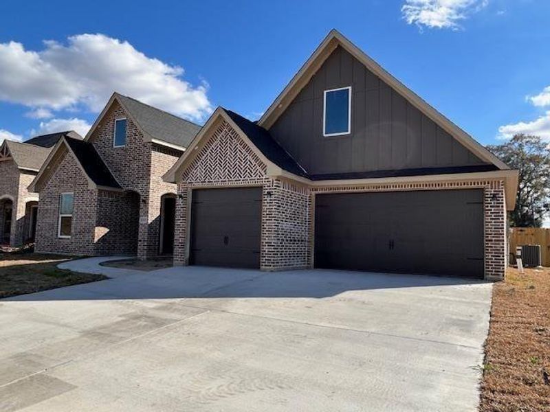 Front exterior of a new home in , Beaumont, TX, highlighting curb appeal (Image 1). Front exterior of a new home in , Beaumont, TX, highlighting curb appeal (Image 1).