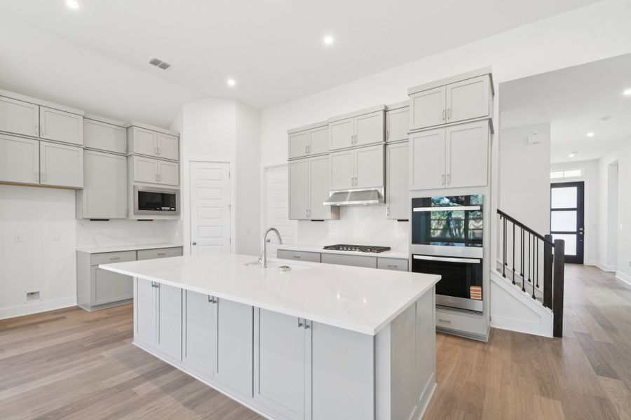 Furnished interior view inside a new home in Persimmon, Buda (Image 5).