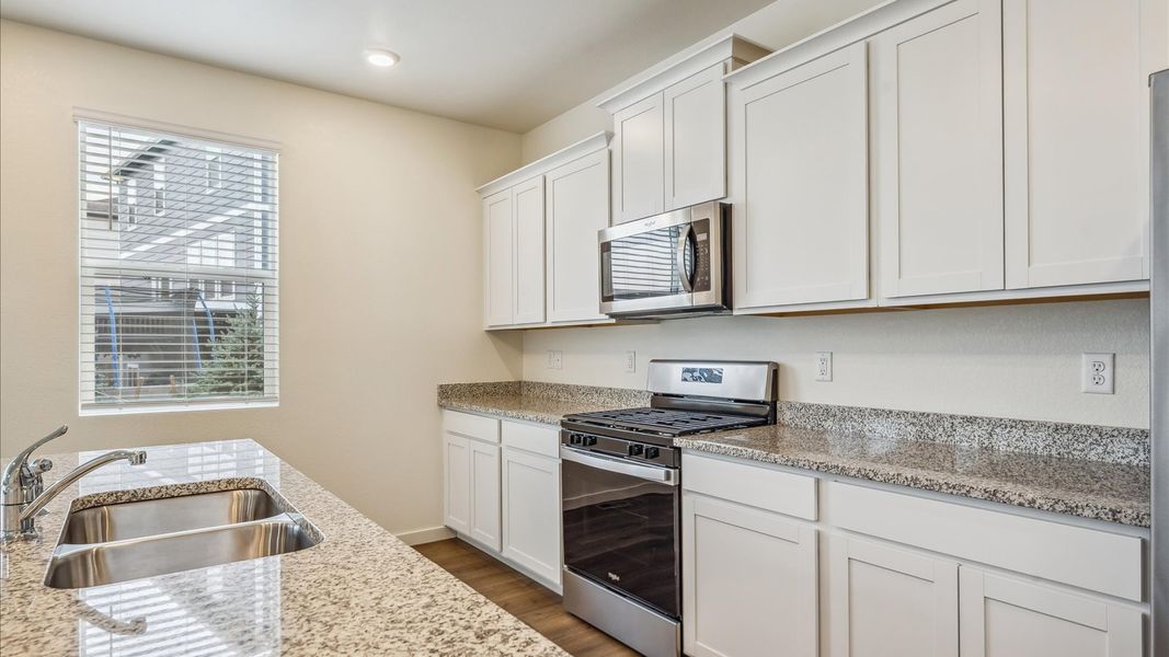 Furnished interior view inside a new home in Settlers Crossing, Commerce City (Image 7).