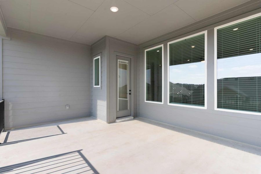 Exterior details and patio area of a home in Lariat, Liberty Hill (Image 15).