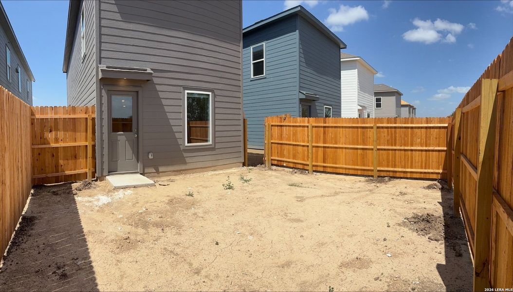 Exterior details and patio area of a home in Sapphire Meadows, San Antonio (Image 2).