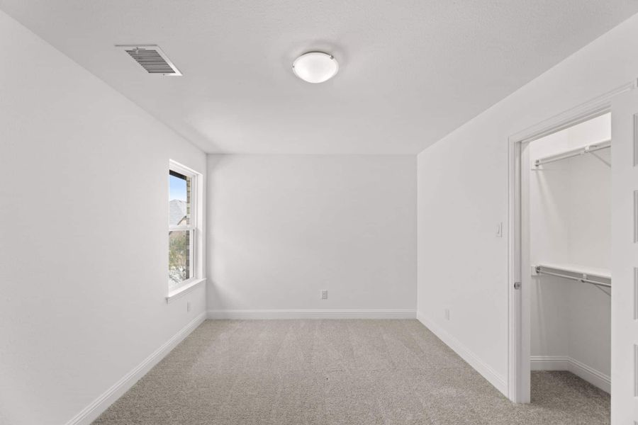 Representative unfurnished interior of a home built from the Tucker by UnionMain Homes in Elevon, Lavon (Image 13).