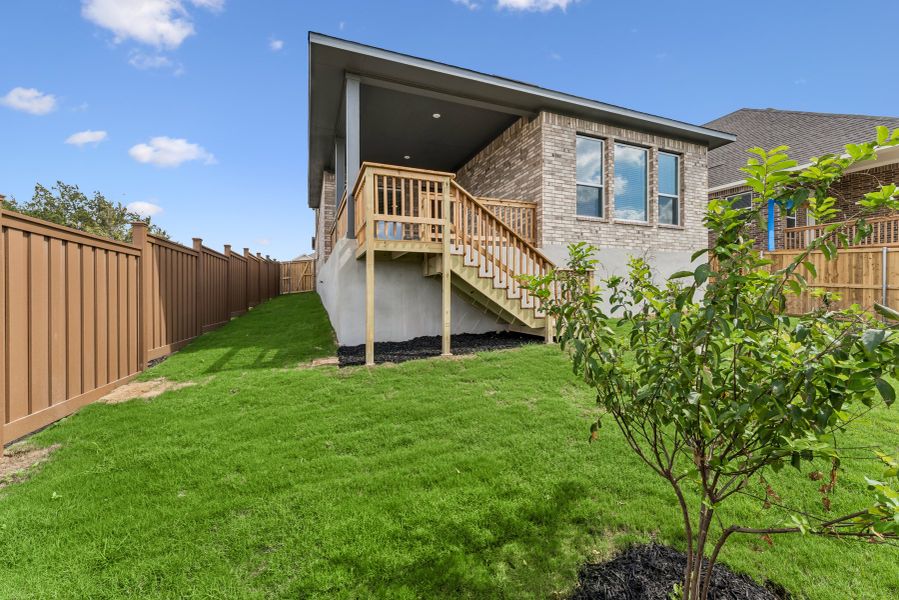 Exterior details and patio area of a home in Mayfair - Select Garden Series, New Braunfels (Image 3). Exterior details and patio area of a home in Mayfair - Select Garden Series, New Braunfels (Image 3).