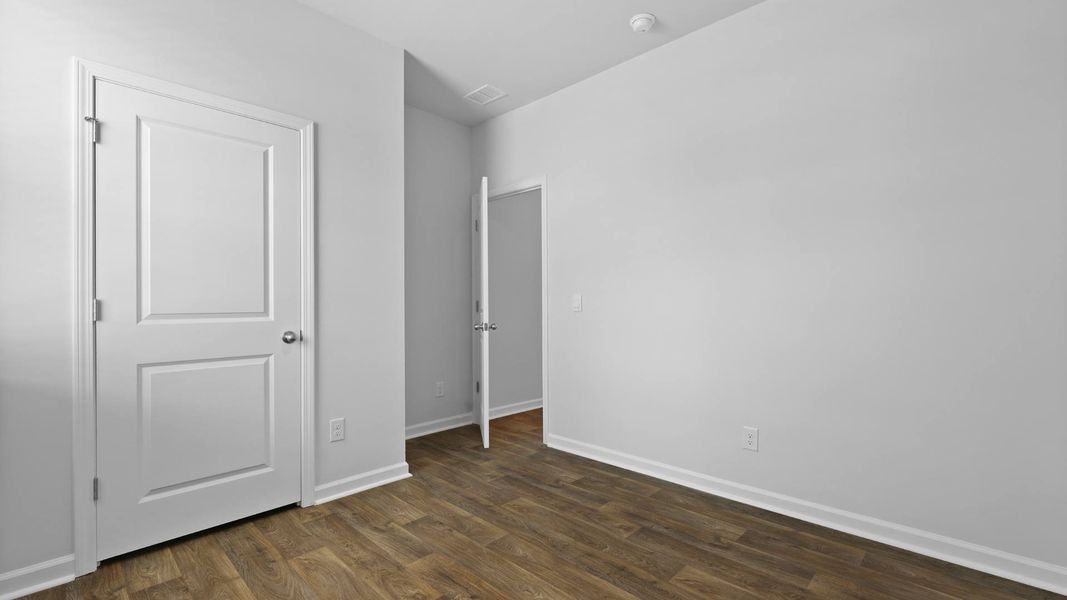 Spacious, unfurnished interior of a new home in Pine Hills at Cane Bay, Summerville (Image 7). Spacious, unfurnished interior of a new home in Pine Hills at Cane Bay, Summerville (Image 7).