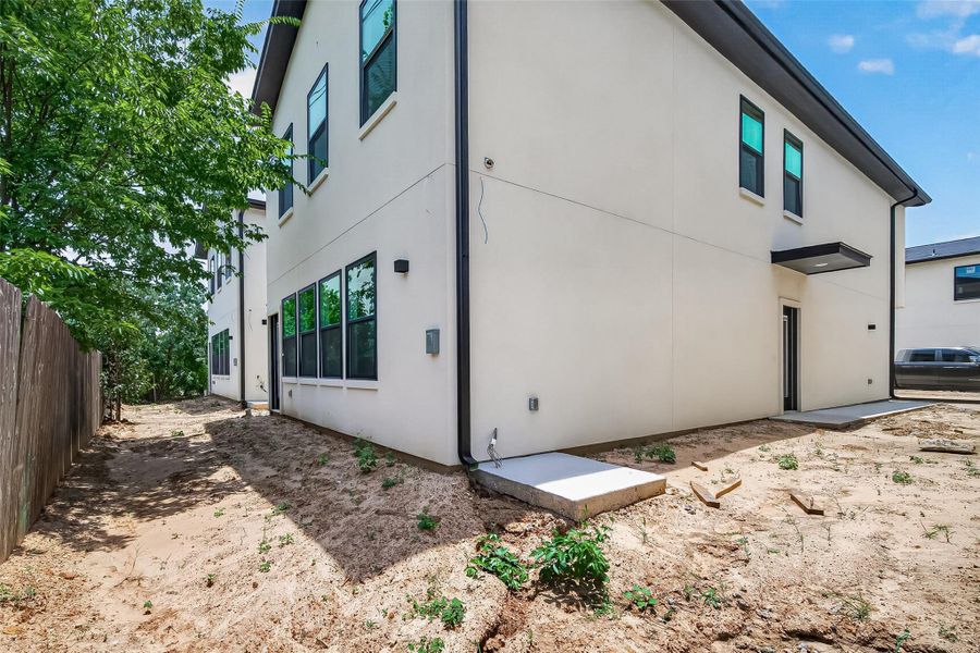 Exterior details and patio area of a home in , Spring (Image 3).