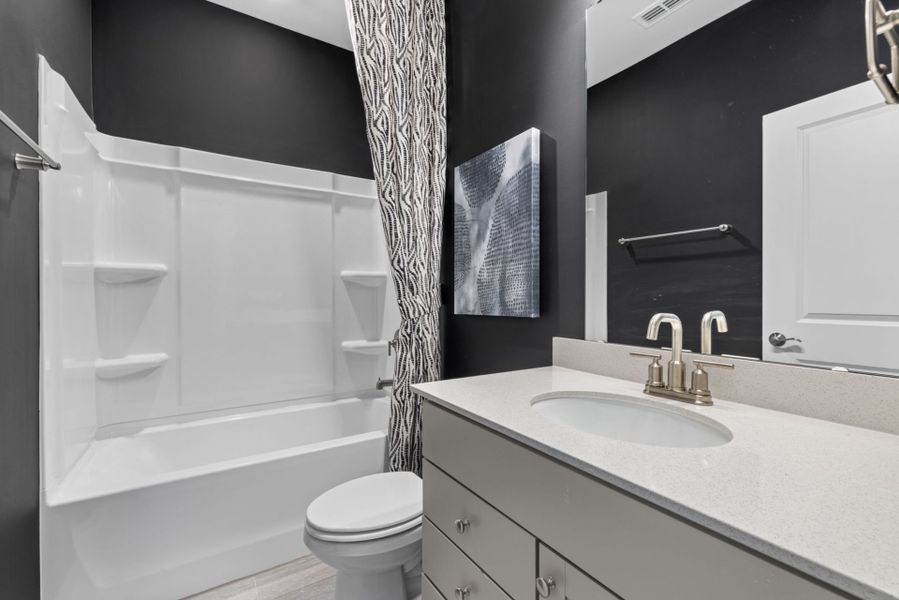 Furnished interior view inside a new home in Huxley, Apex (Image 8). Furnished interior view inside a new home in Huxley, Apex (Image 8).