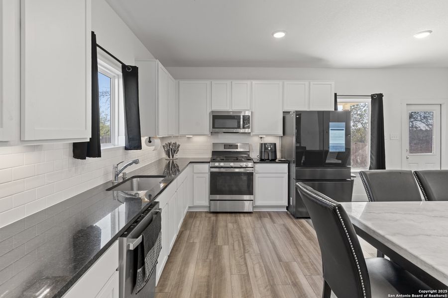 Furnished interior view inside a new home in Hickory Ridge, Elmendorf (Image 16).
