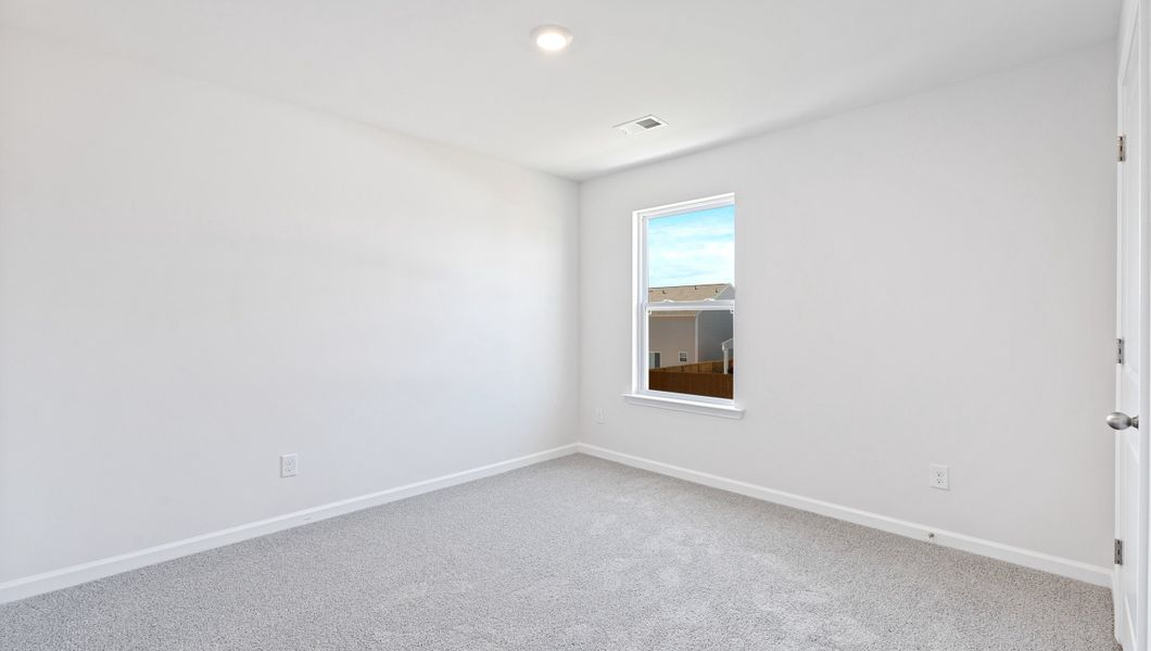 Spacious, unfurnished interior of a new home in Durbin Meadows Traditions, Fountain Inn (Image 25).