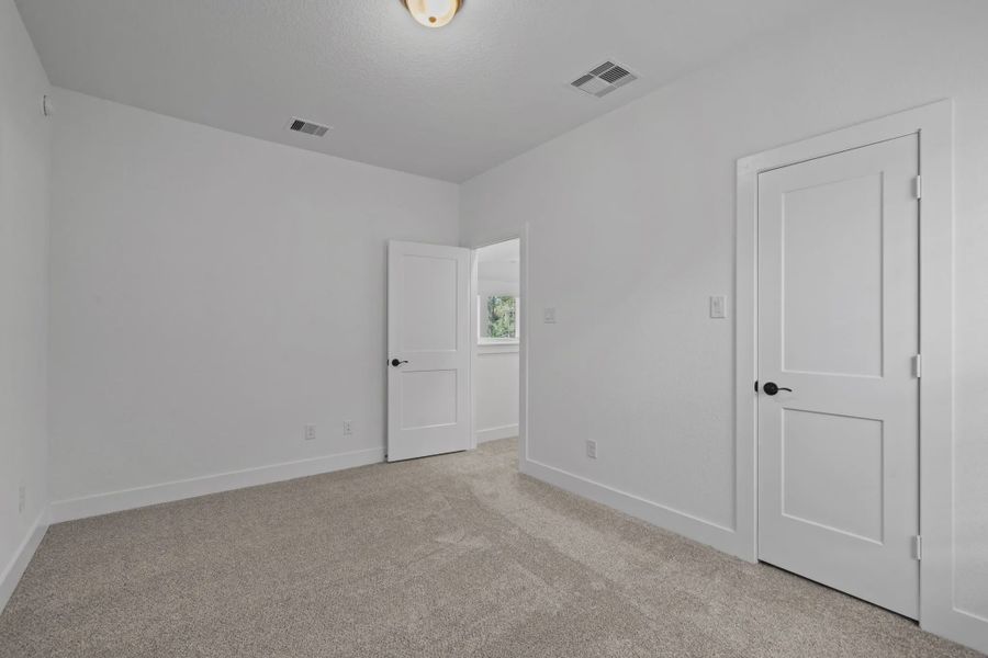 Representative unfurnished interior of a home built from the San Francisco by Chesmar Homes in The Woodlands Hills, Willis (Image 47). Representative unfurnished interior of a home built from the San Francisco by Chesmar Homes in The Woodlands Hills, Willis (Image 47).