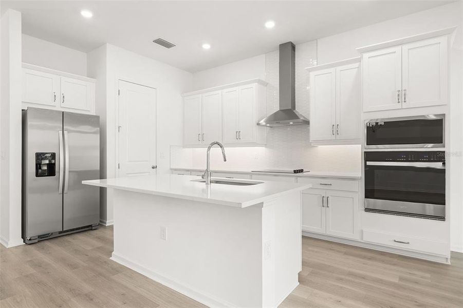 Furnished interior view inside a new home in Serenade at Ovation, Winter Garden (Image 13).