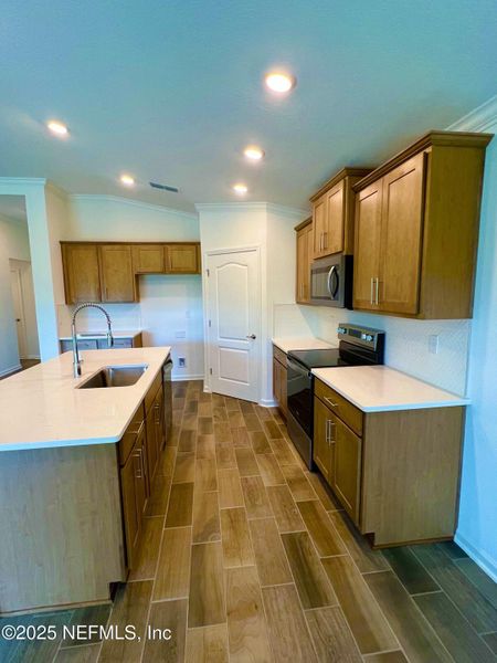 Furnished interior view inside a new home in American Village, Palm Coast (Image 7).