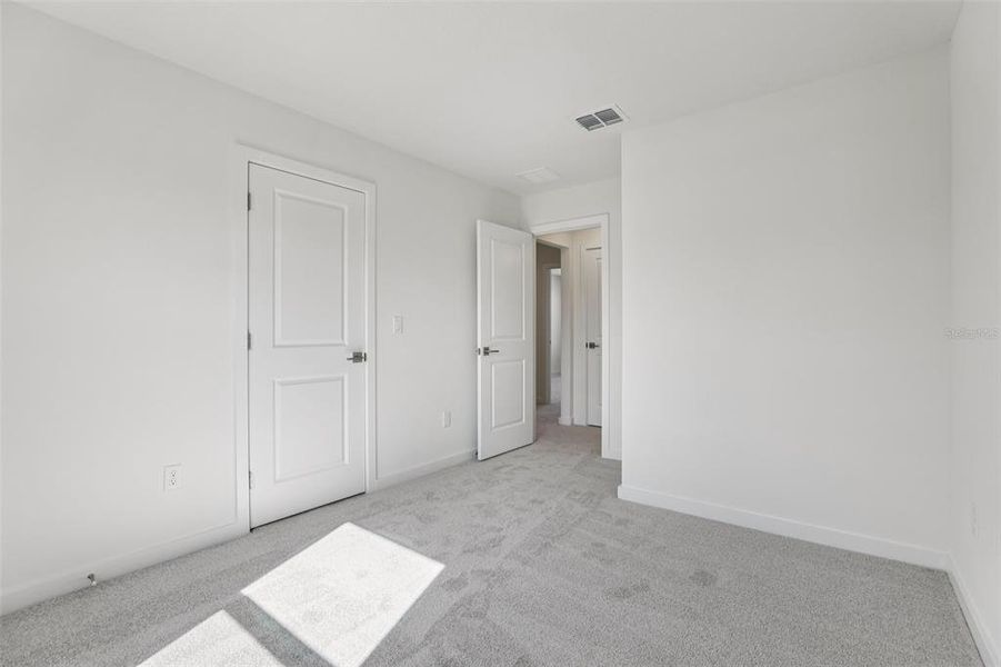 Spacious, unfurnished interior of a new home in Cyrene at Harmony, St. Cloud (Image 28). Spacious, unfurnished interior of a new home in Cyrene at Harmony, St. Cloud (Image 28).